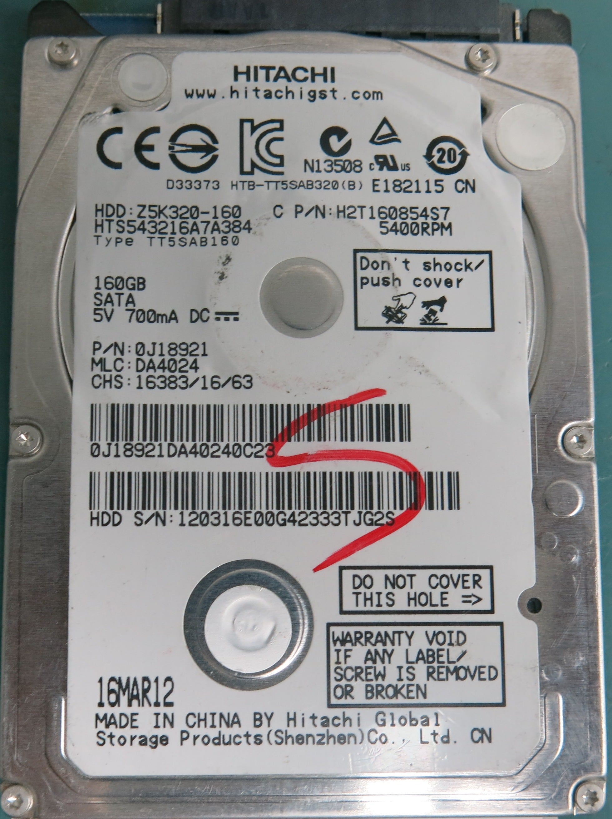 HTS543216A7A384, Serial Number: 120316E00G42333TJG2S, P/N: 0J18921, MLC: DA4024, 160GB 2.5