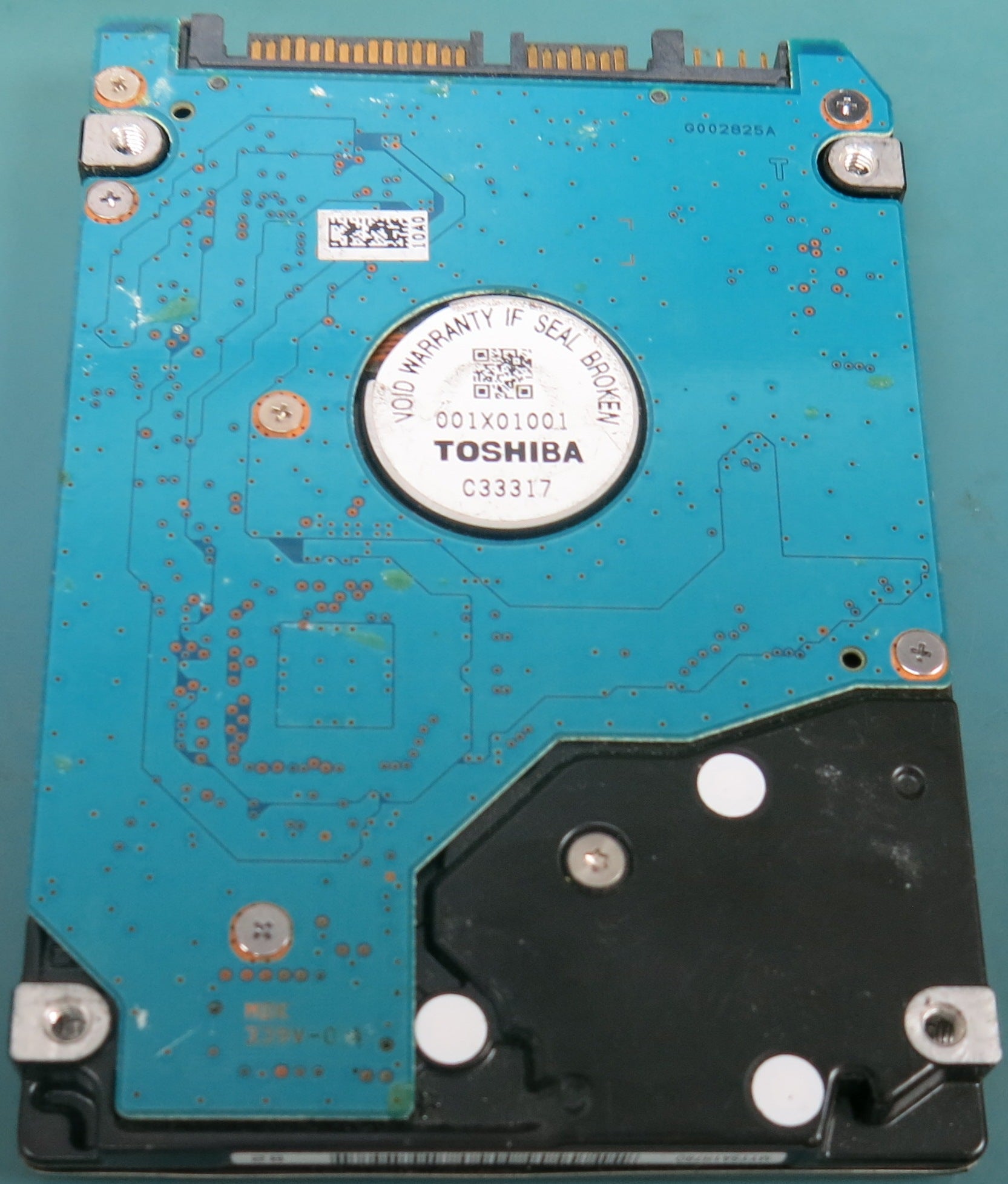 MK3275GSX,  350GB 2.5,  PCB: G002825A,  S/N: 92E7F2HQS Q19 EC.A,