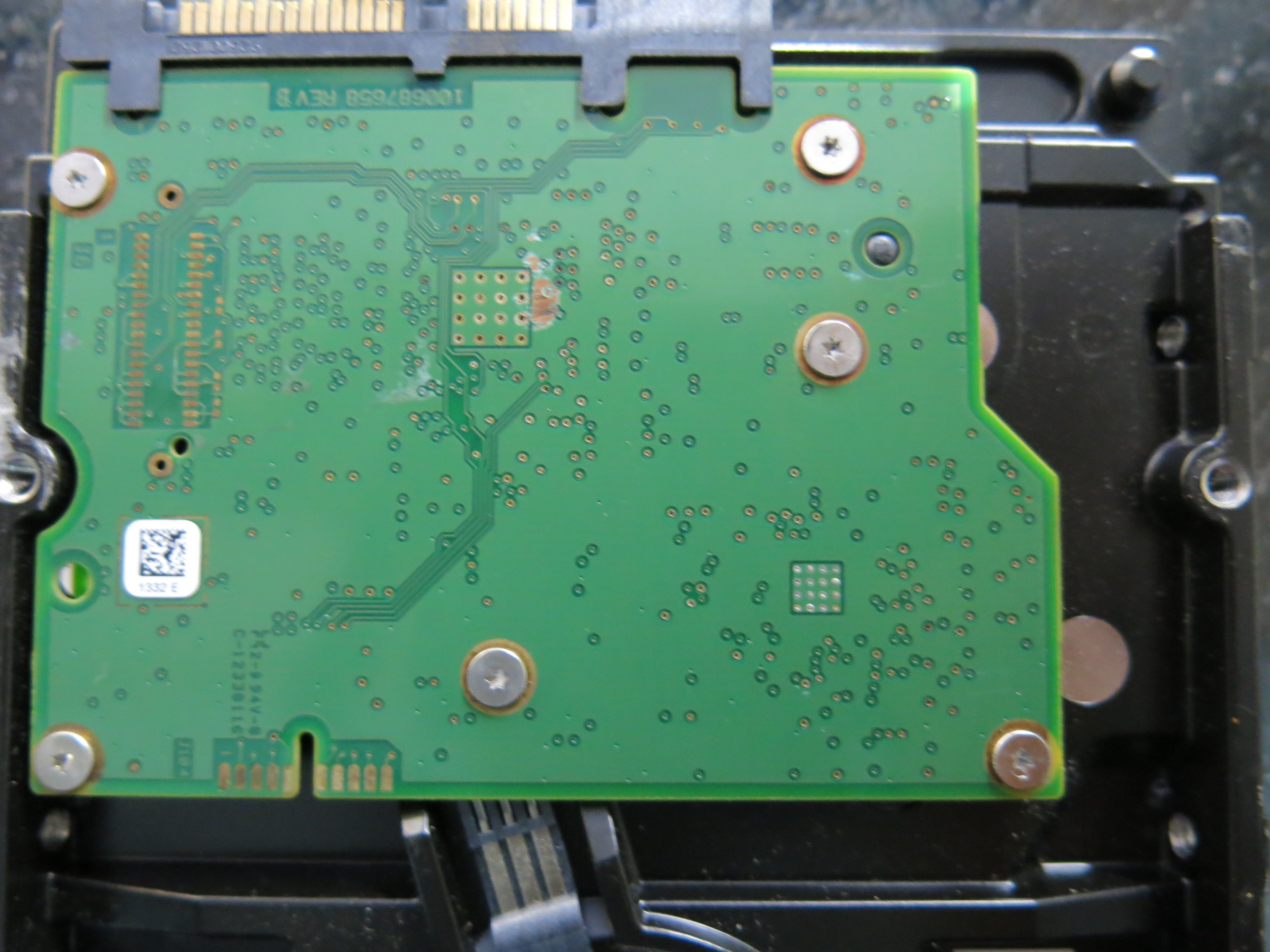 ST1000VM002 PCB: 100687658 REV B SERIAL NUMBER: S1G0AQJP FW:ES22 PN:ES22 1.TB