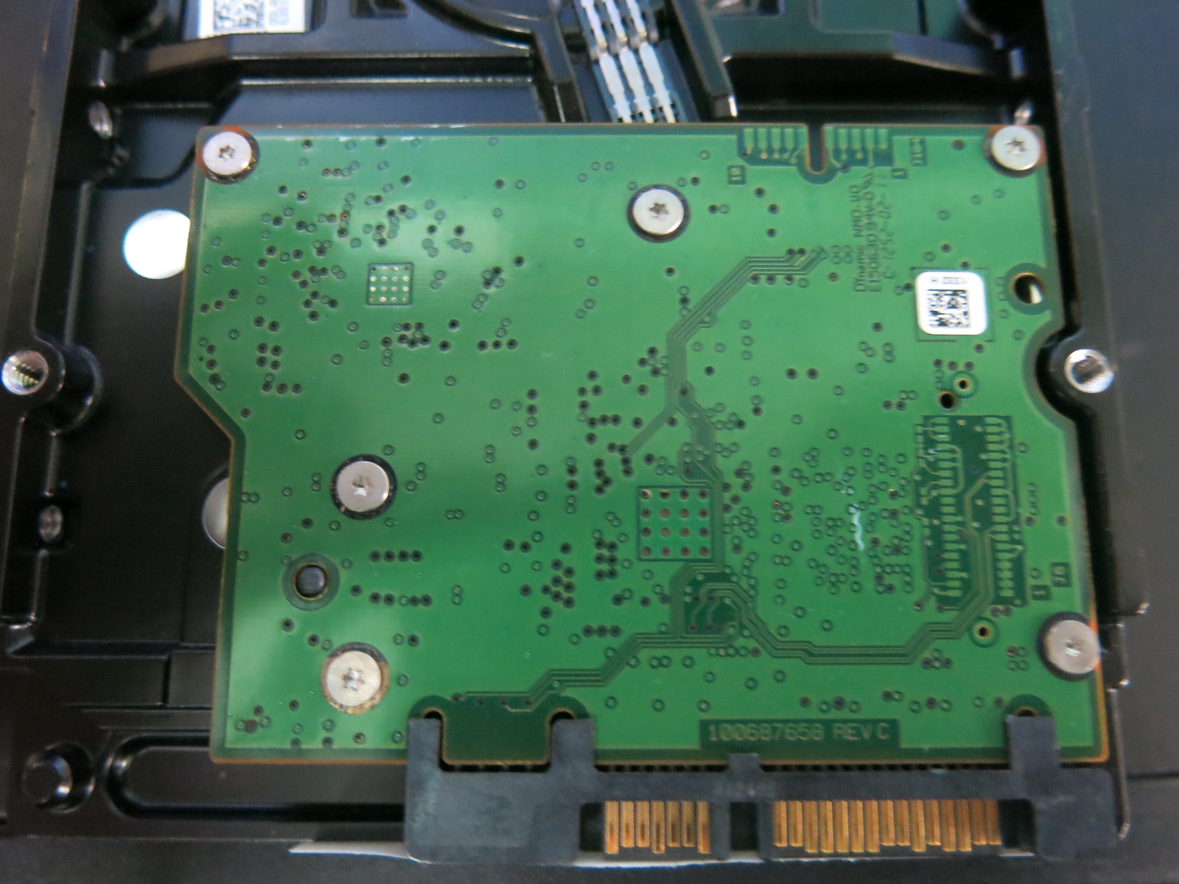 ST1000VM002 PCB : 100687658 REV C SERIAL NUMBER : S1G0QLY4 FW:ES22 PN:1CT162-262 1.TB