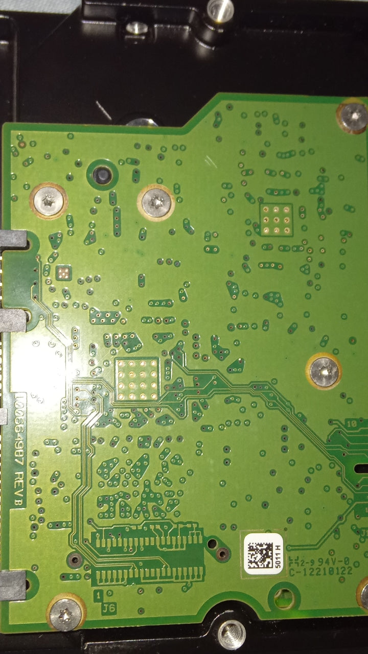 ST2000DM001    PCB : 100664987 REV B  SERIAL NUMBER : Z1E10M3W FW:9YN164-505 2TB