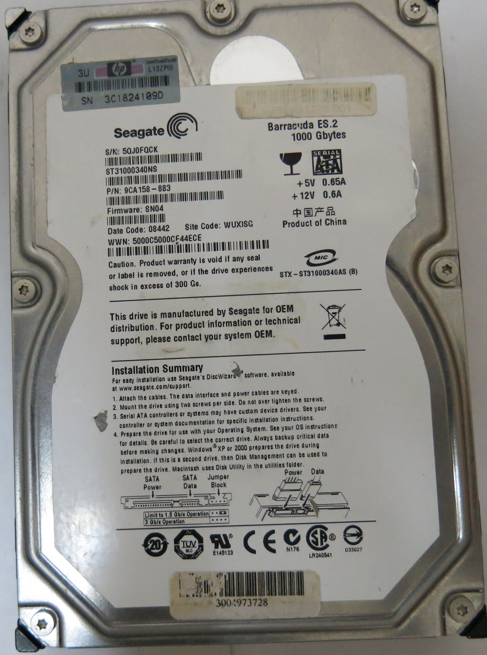ST31000340NS,  P/N:9CA158-883,  FW:SN04,  Serial:5QJ0FQCK,  1000GB 3.5,  PCB:100466824- REV C,