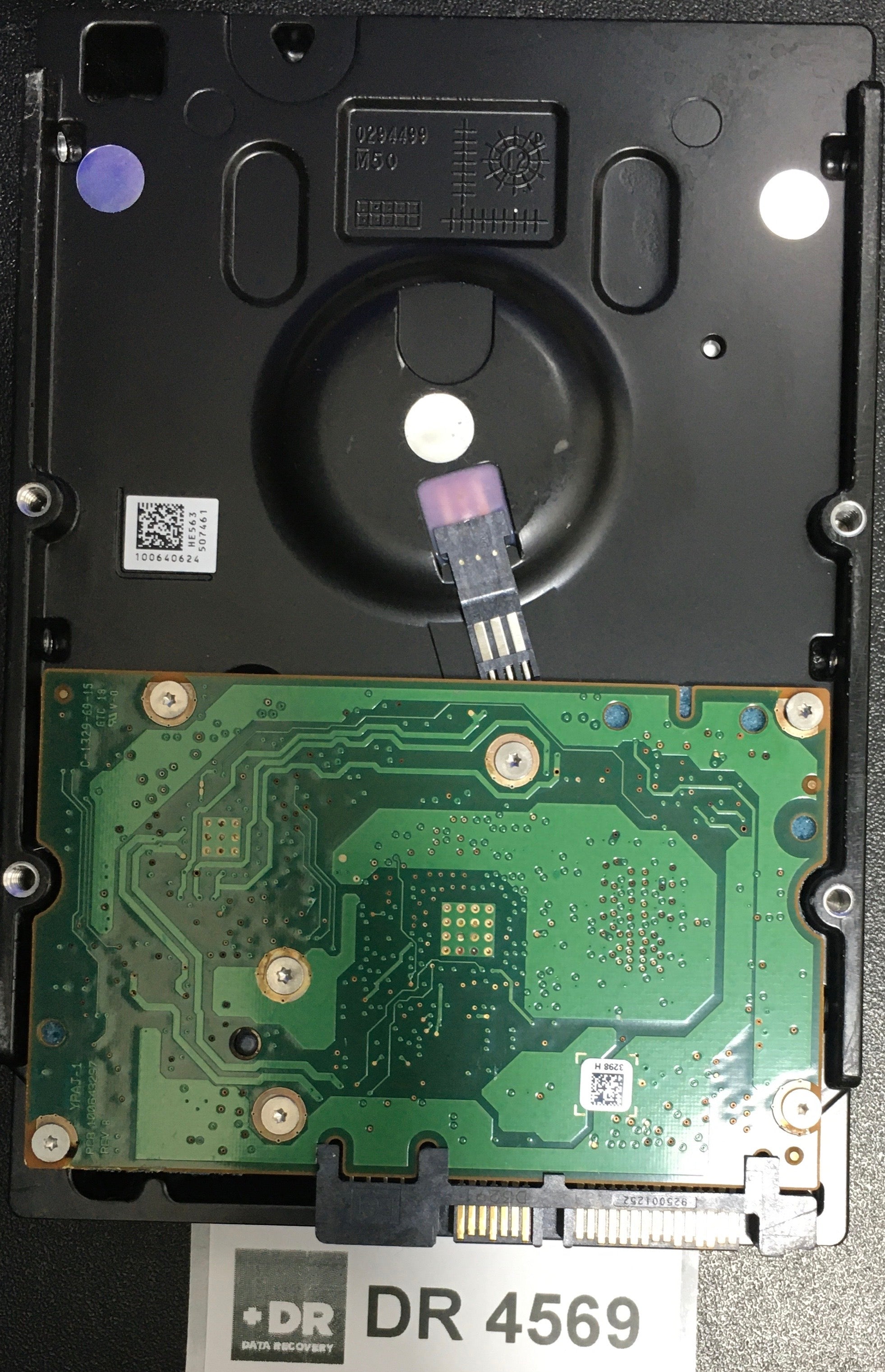 ST2000NM0011,  P/N: 9YZ168'090,  FW: PT05,  Serial: Z1P66EJV,  2000GB 3.5  100643297 PCB:- REV B