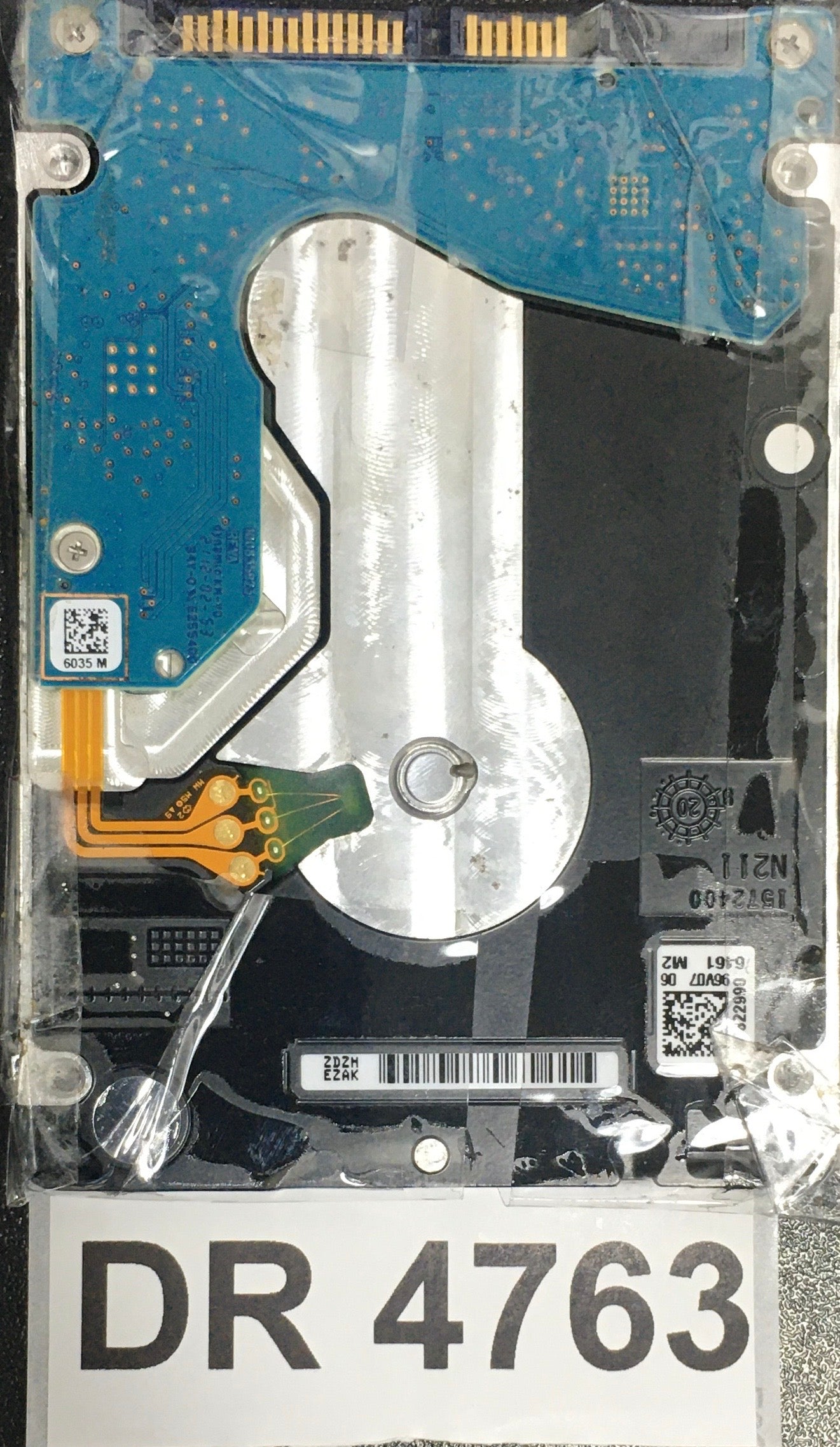 ST2000LM007,  FW: EB01,  Serial: ZDZHEZAK,  2TB 2.5,  PCB: 100835923- REV A,