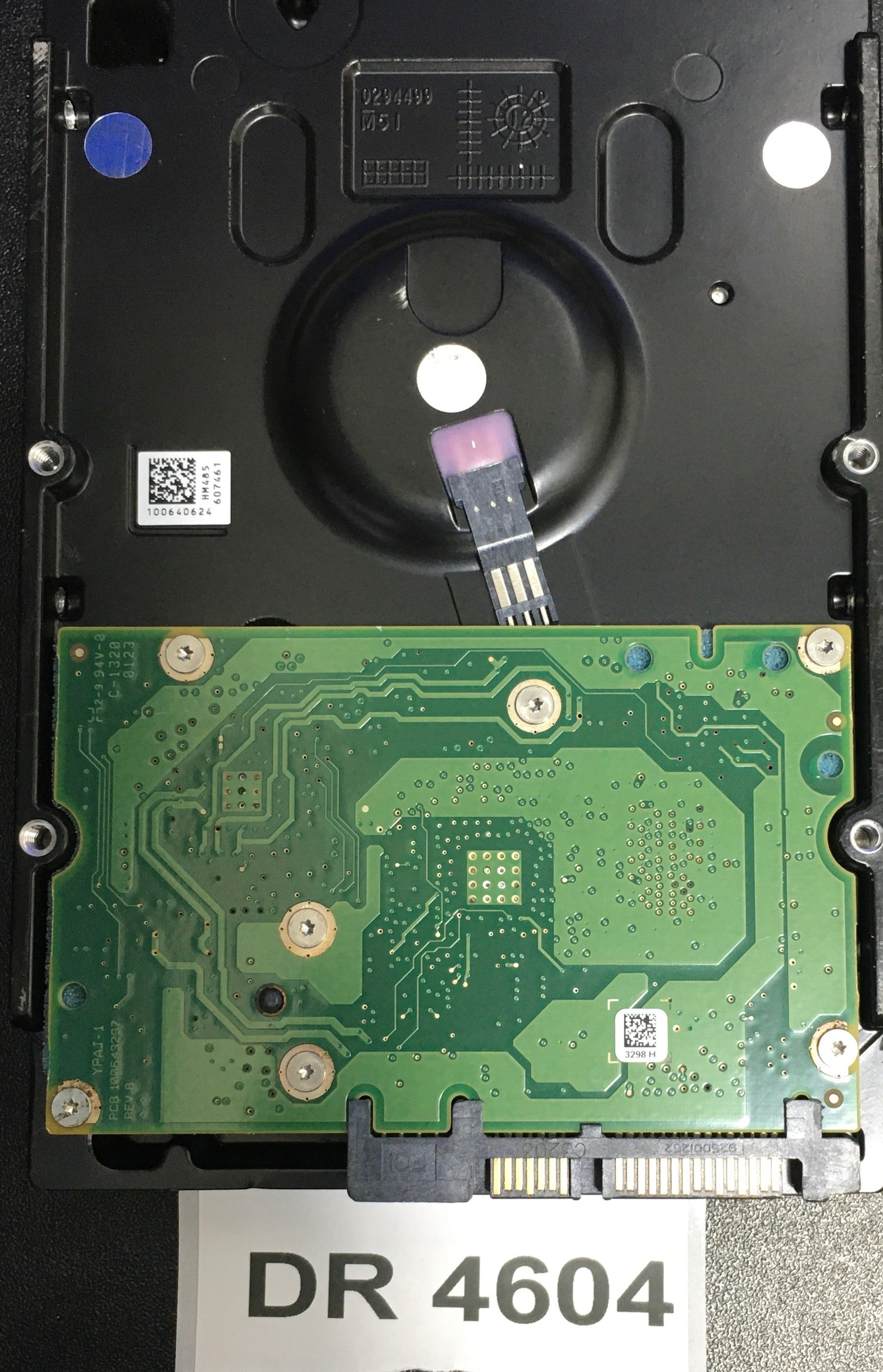 ST2000NM0011,  P/N: 9YZ168-090,  FW: PT05,  Serial: Z1P66N8R,  2000GB 3.5  PCB:100643297- REV B