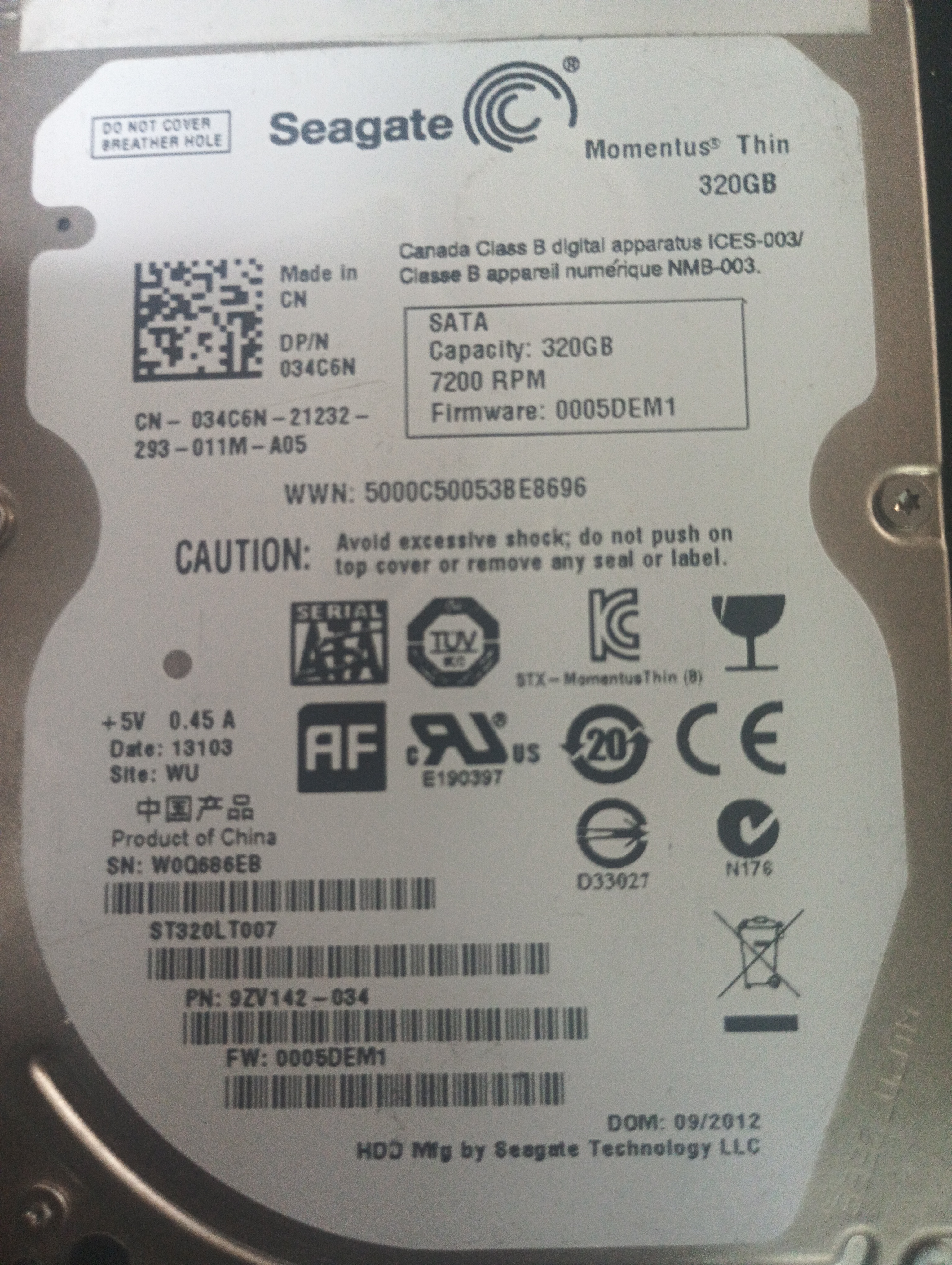 ST320LT007,  P/N: 9ZV142-034,  FW: 0005DEM1,  Serial: W0Q686EB,  320GB 2.5,  PCB: 100654403- REV B,