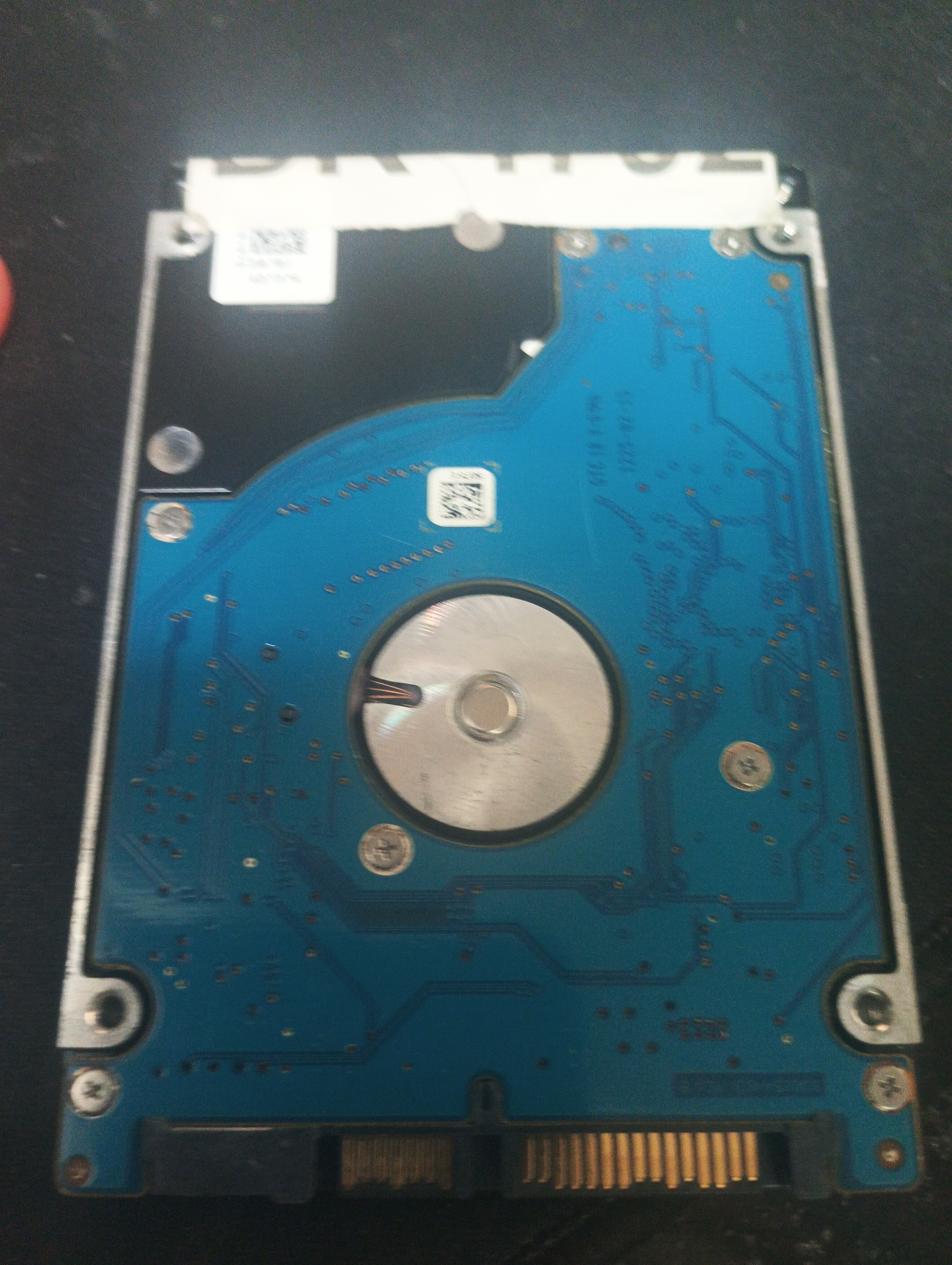 ST320LT007,  P/N: 9ZV142-034,  FW: 0005DEM1,  Serial: W0Q686EB,  320GB 2.5,  PCB: 100654403- REV B,