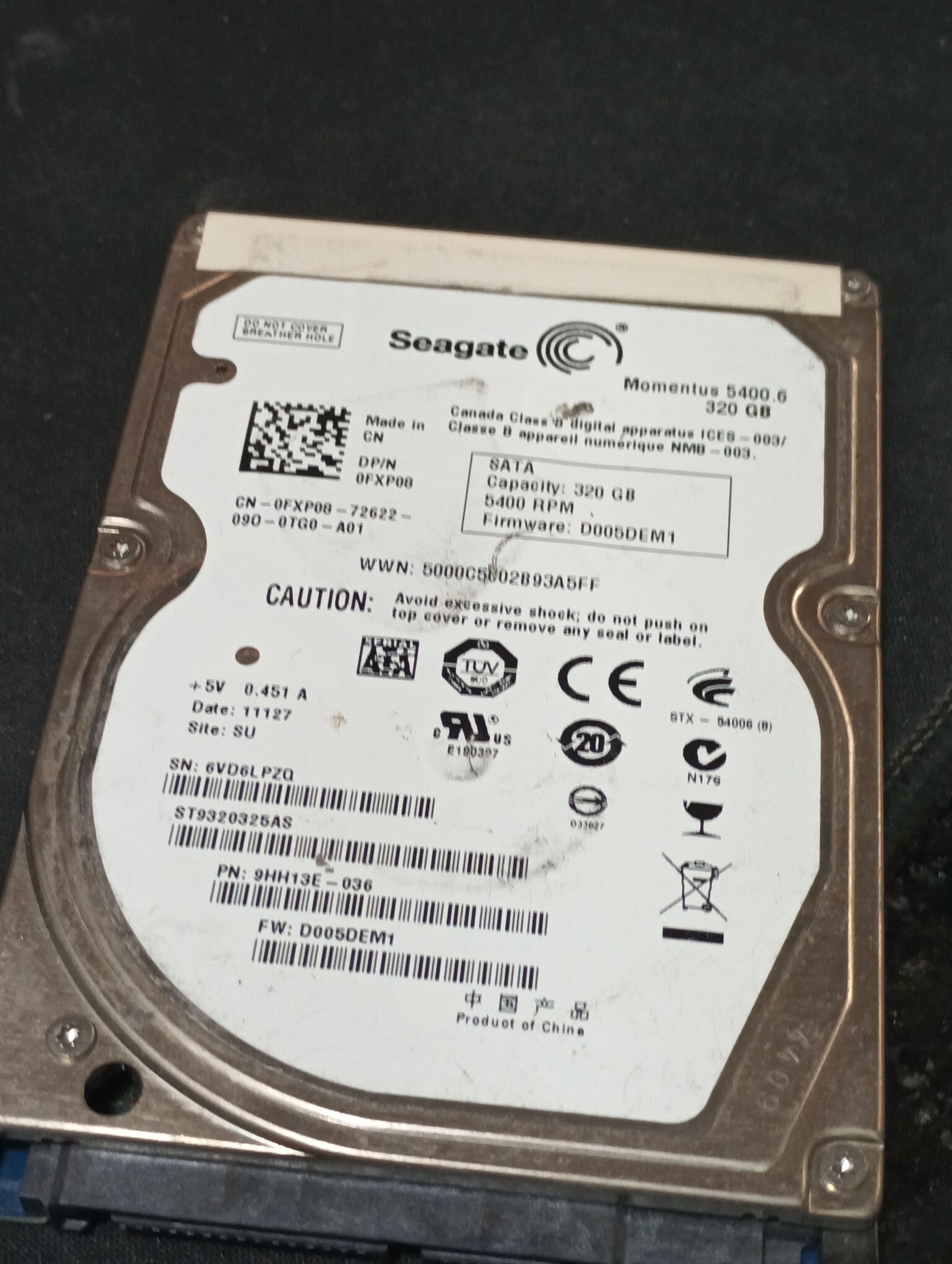 ST9320325AS,  P/N: 9HH13E-036,  FW: D005DEM1,  Serial: 6VD6LPZQ,  320GB 2.5  PCB:100536286- REV E