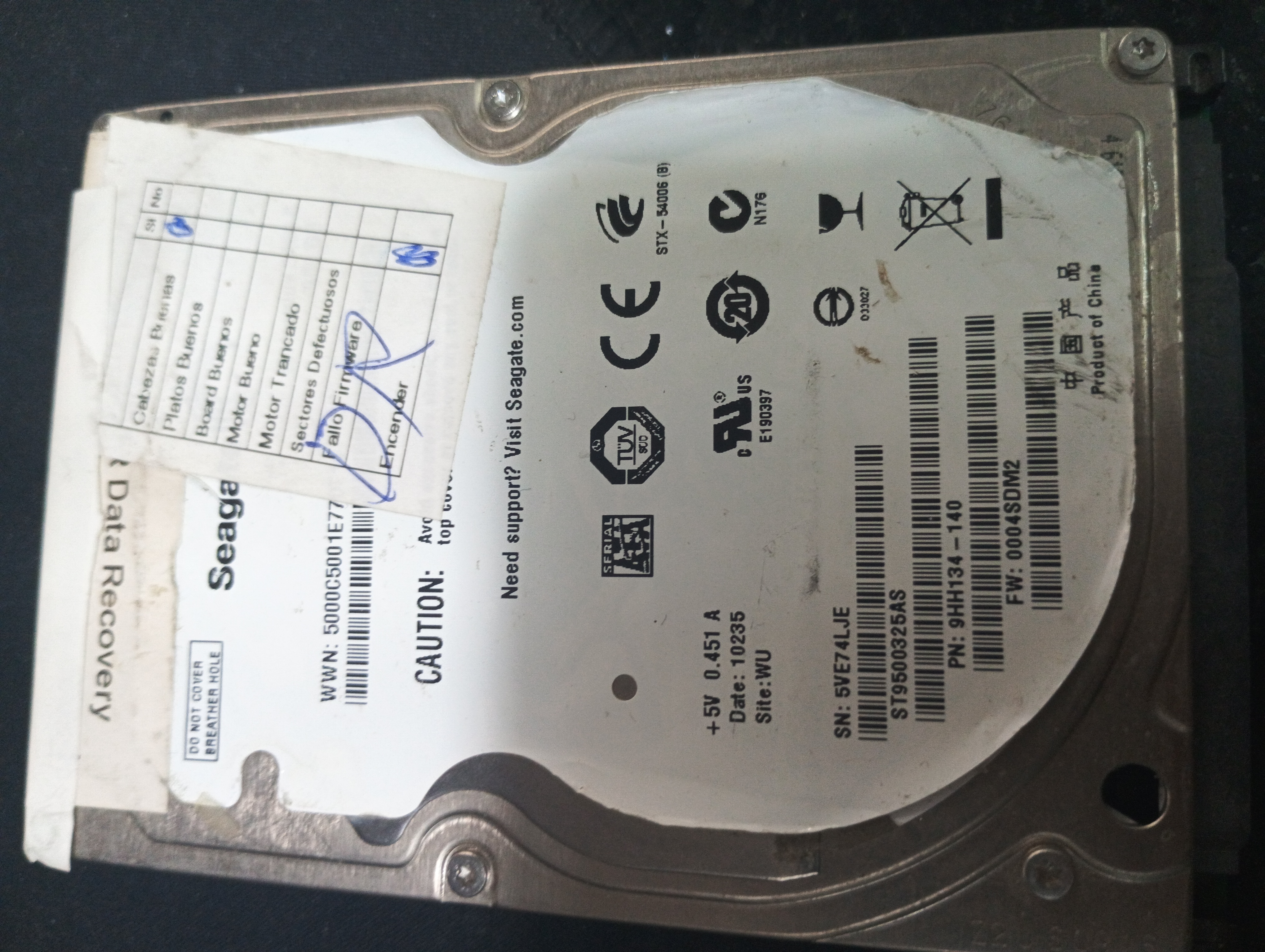ST9500325AS,  P/N: 9HH134-140,  FW: 0004SDM2,  Serial: 5VE74LJE,  500GB 2.5,  PCB: 100398689- REV B,