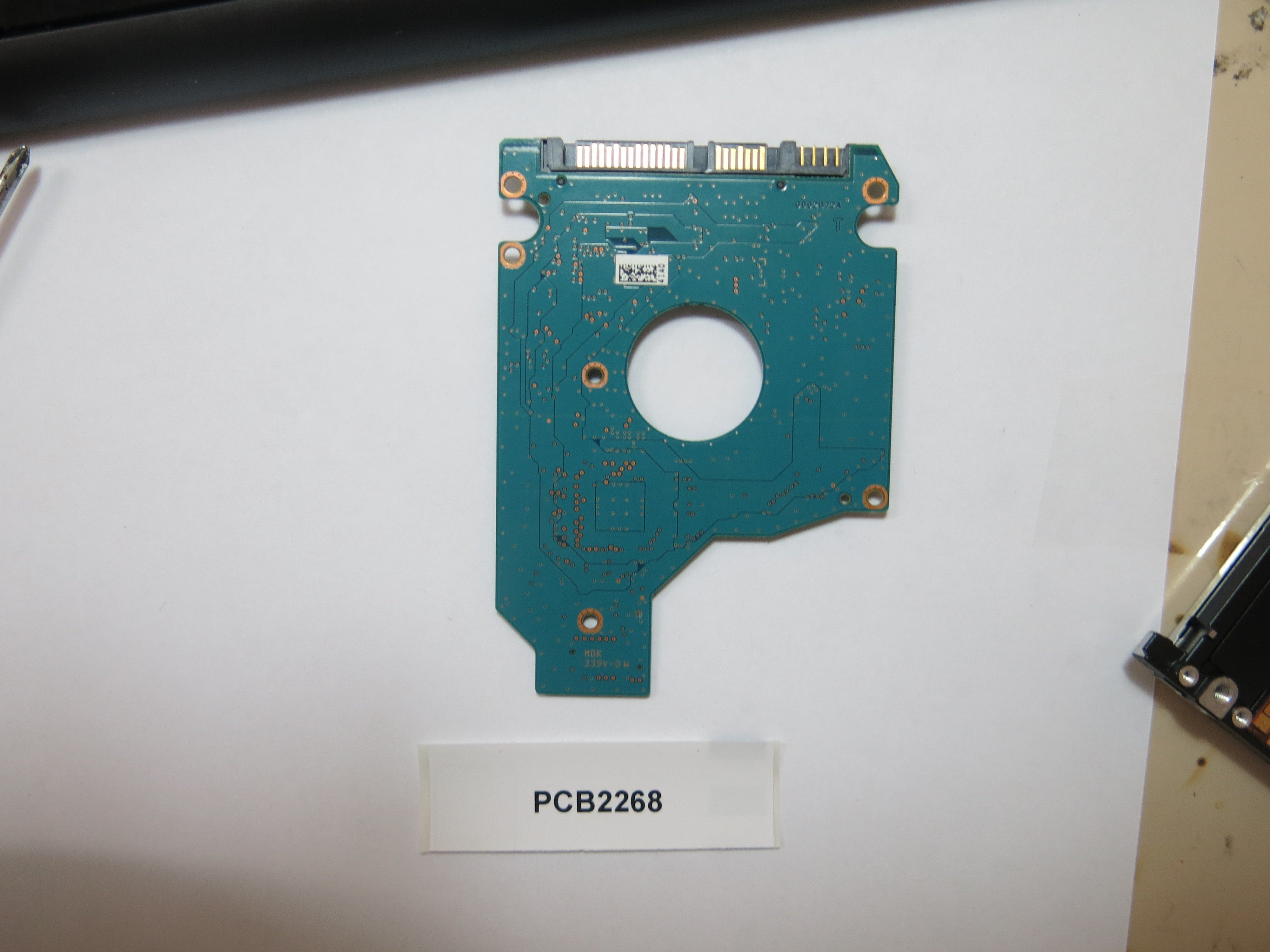TOSHIBA MK3261GSYN HDD2F23 D UF01 T, MH000D PCB