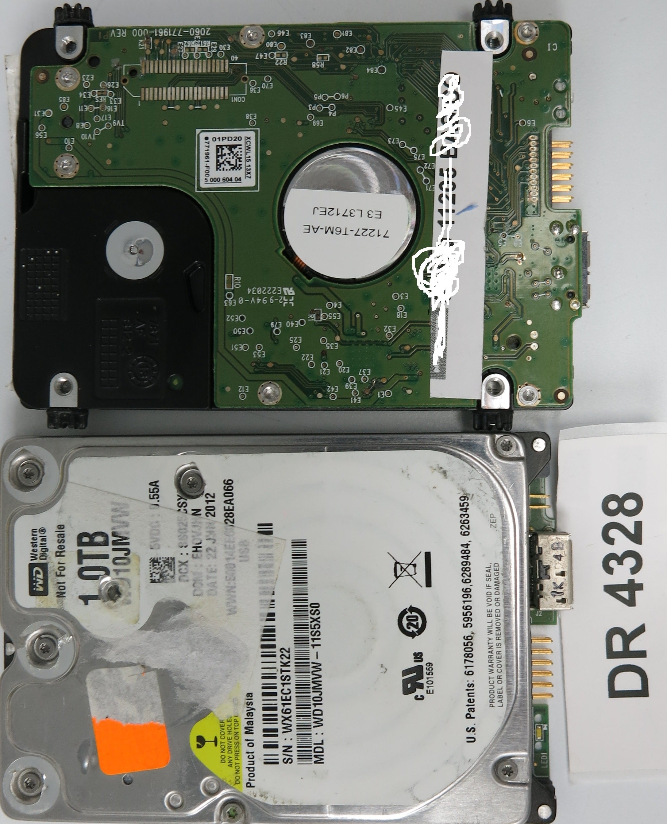 WD10JMVW-11AJGS0,  DCM: HBKTJBNB,  Serial: WXA1A63R6417,  1.0TB 3.5