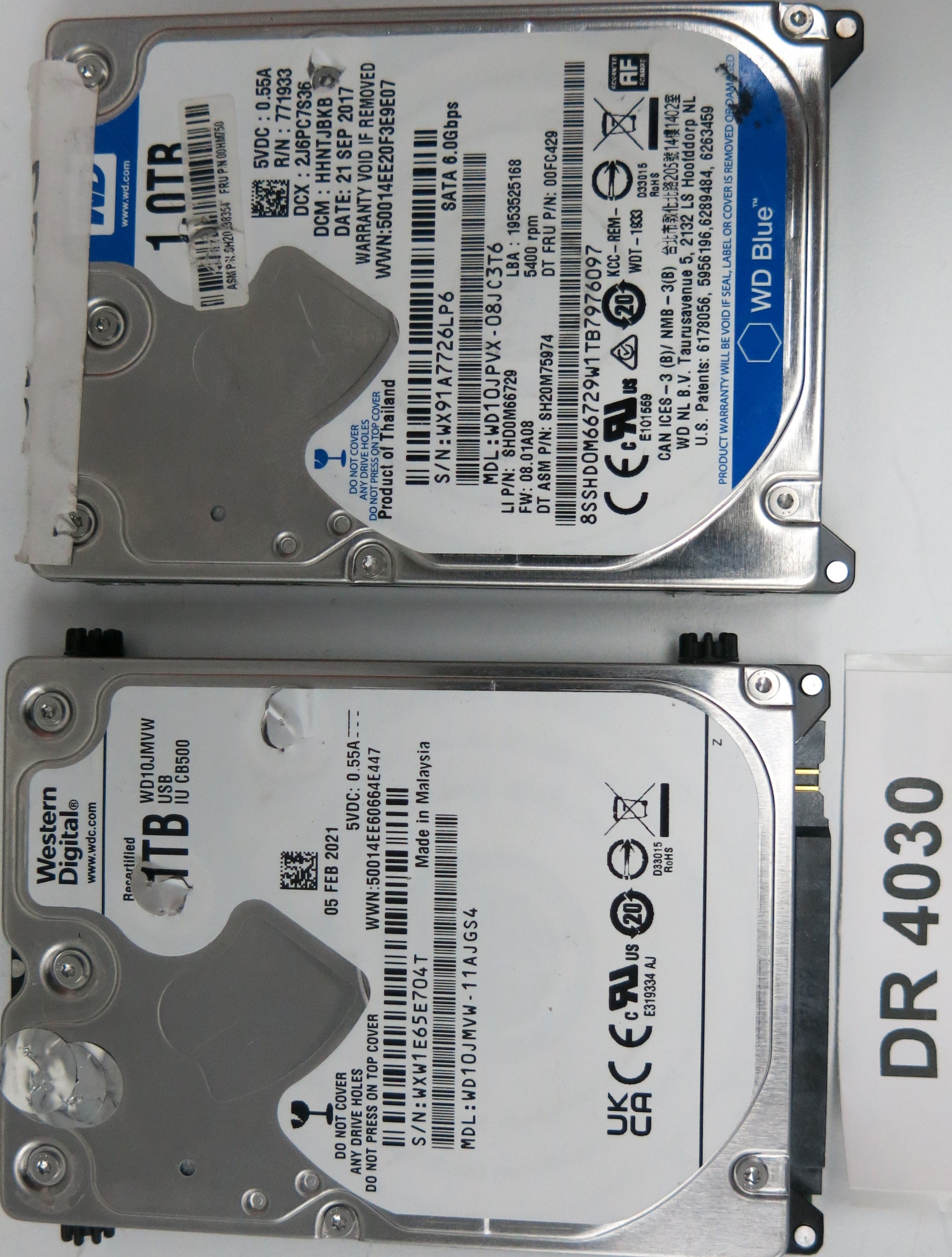 WD10JMVW-11AJGS4, Serial Number: WXW1E65E704T, 1TB 2.5, PCB 2060771960-000 REV A
