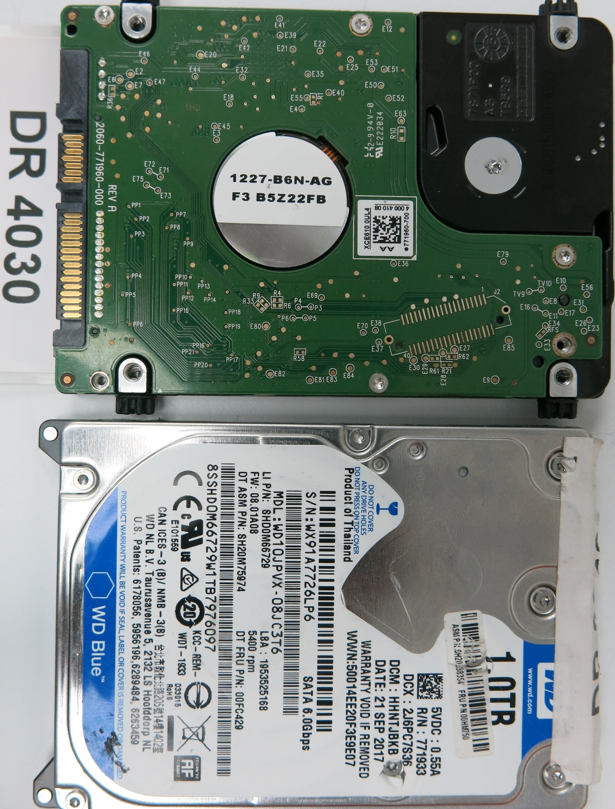 WD10JMVW-11AJGS4, Serial Number: WXW1E65E704T, 1TB 2.5, PCB 2060771960-000 REV A