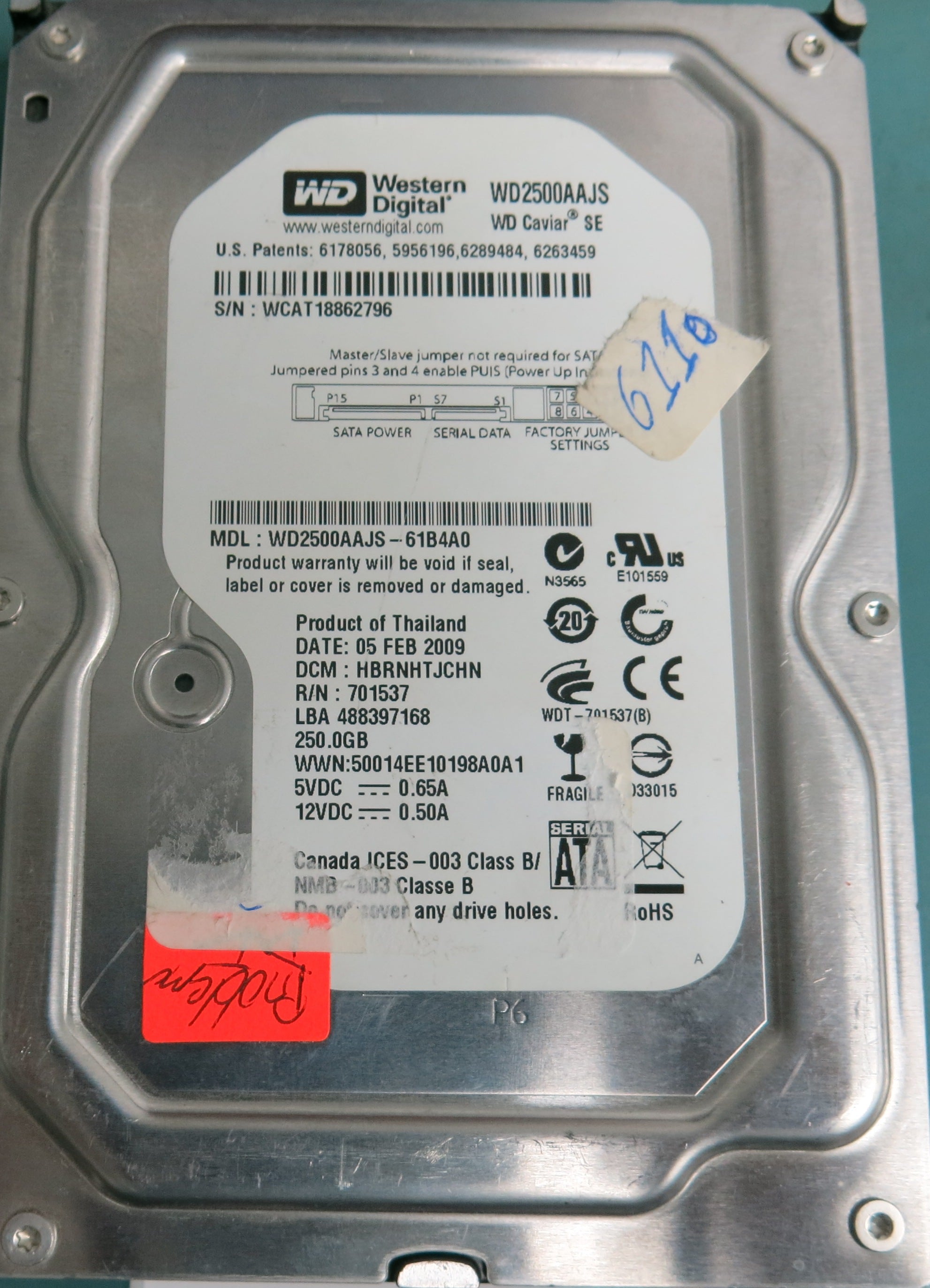 Model:  WD2500AAJS-61B4A0  DCM HBRNHTJCHN  Serial Number: WCAT18862796  250.0GB 3.5  PCB 2060-701537-003 REV A  DR1750@