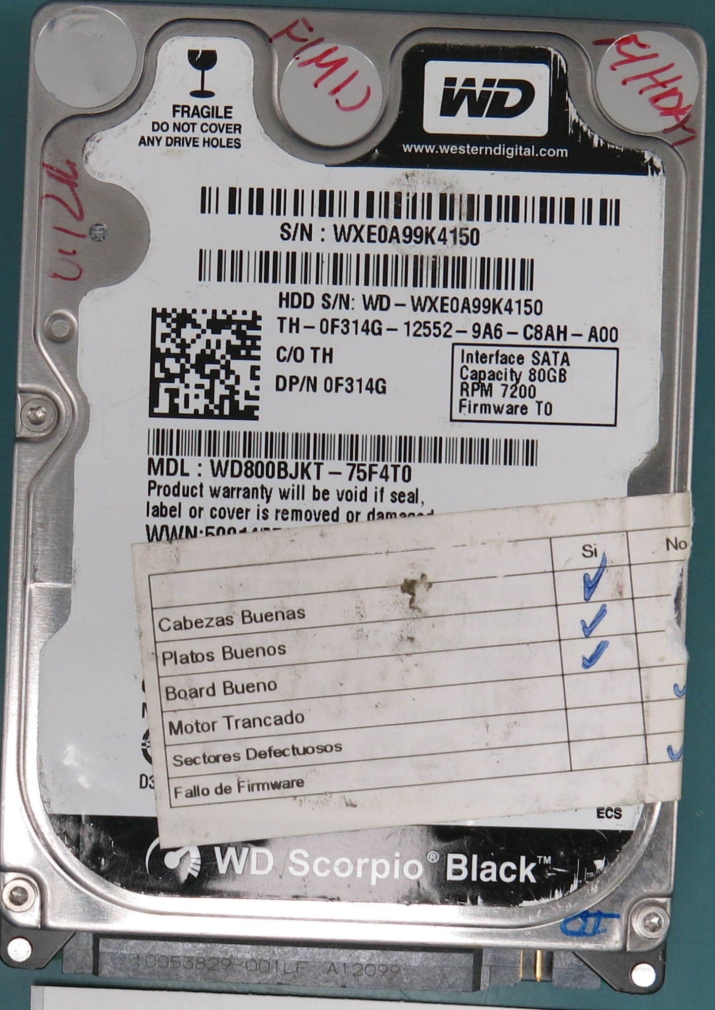 WD800BJKT-75F4T0,  DCM ,  Serial Number:  WXE0A99K4150,  80GB 2.5,  PCB 2060-701499-005 REV A,
