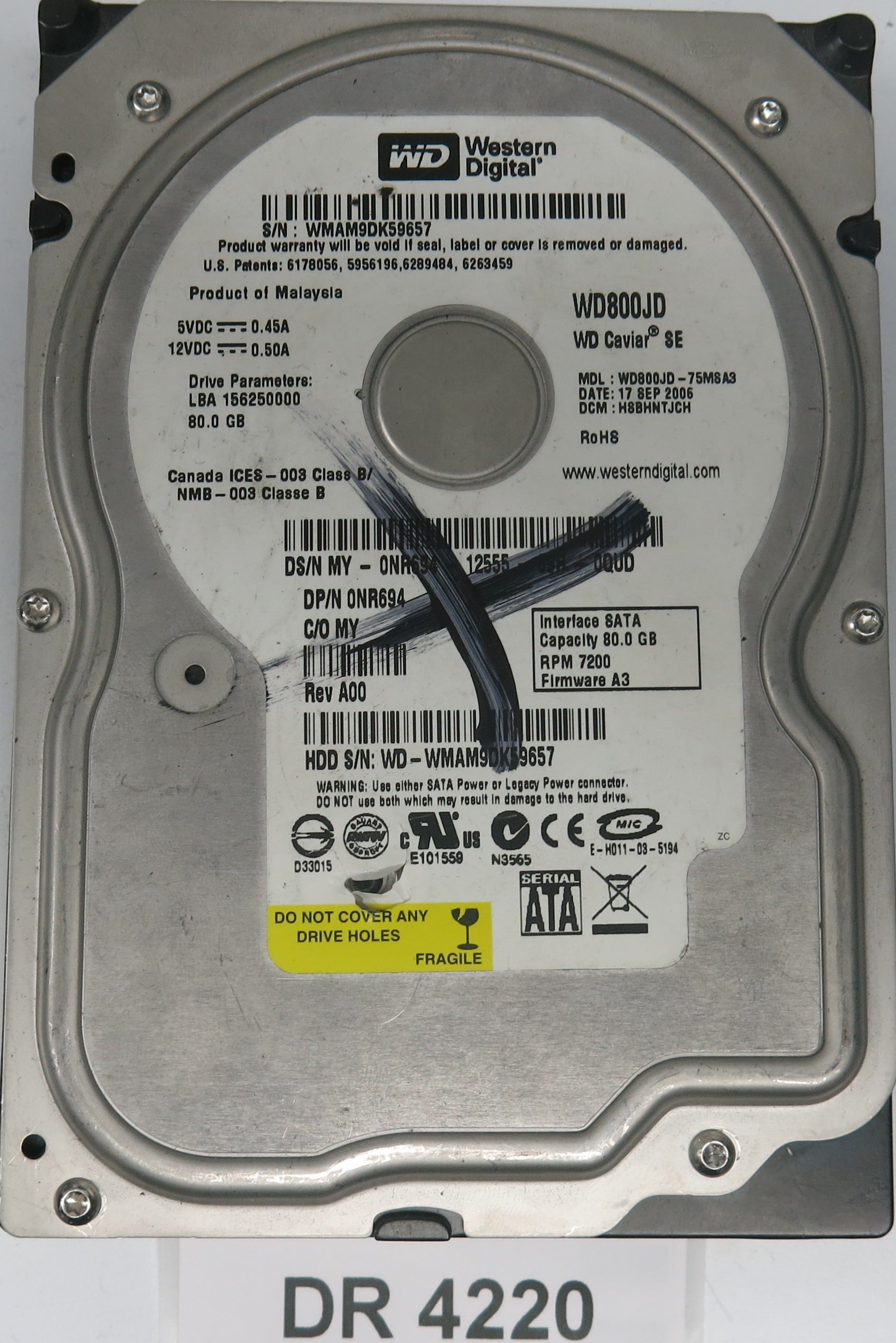 WD800JD-75MSA3,  DCM: HSBHNTJCH,  Serial: WMAM9DK59657,  80GB 3.5,  PCB 2060-701335-005 REV A